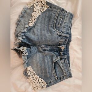 Distressed Denim Shorts with Crochet Trim